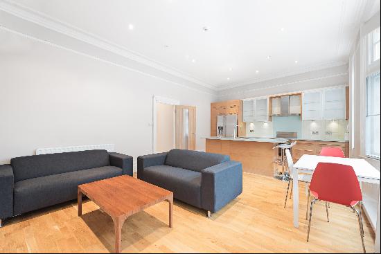 A bright first floor apartment to let in Kensington, W8