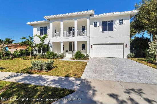 With over 6200 total square feet in the residence, this five bedroom, five and a half bath