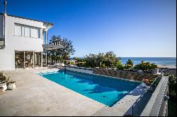 LUXURIOUS COASTAL LIVING WITH THIS EXTRAORDINARY 5-BEDROOM HOME LOCATED IN PRESTIGIOUS CA