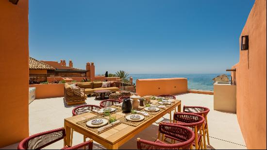 Distinguished front line beach duplex penthouse in La Morera, Marbella East and direct ac