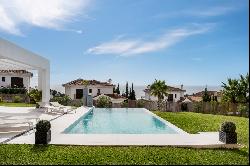 Modern villa with stunning green surroundings and seaviews in Mijas area