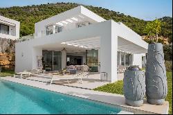 Modern villa with stunning green surroundings and seaviews in Mijas area