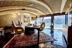 Lugano-Melide: modern penthouse apartment with a magical view of Lake Lugano for sale