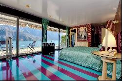 Lugano-Melide: modern penthouse apartment with a magical view of Lake Lugano for sale