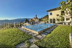 Pool & view of Lake Lugano: modern villa in Lugano-Cureggia for sale