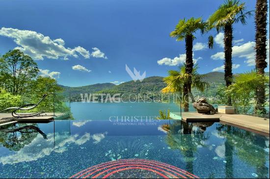 Modern luxury villa overlooking Lake Lugano for sale in Montagnola