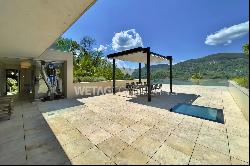 Modern luxury villa overlooking Lake Lugano for sale in Montagnola