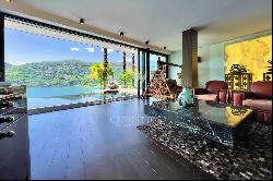 Modern luxury villa overlooking Lake Lugano for sale in Montagnola