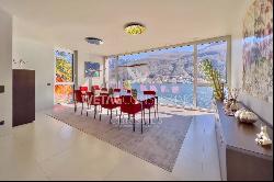 Modern villa for sale in Vico Morcote with garden, swimming pool & magic lake view