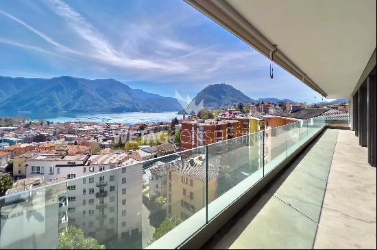 Lugano: duplex-penthouse for sale with large rooftop terrace & enchanting 180 open view 