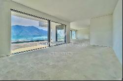 Lugano: duplex-penthouse for sale with large rooftop terrace & enchanting 180° open view 