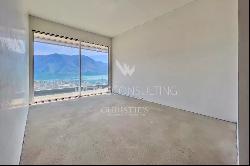 Lugano: duplex-penthouse for sale with large rooftop terrace & enchanting 180° open view 