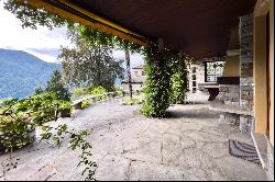 Elegant villa with guest house, pool & lake view for sale in Vico Morcote