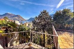 Elegant period villa for sale in Lugano with partial view of Lake Lugano