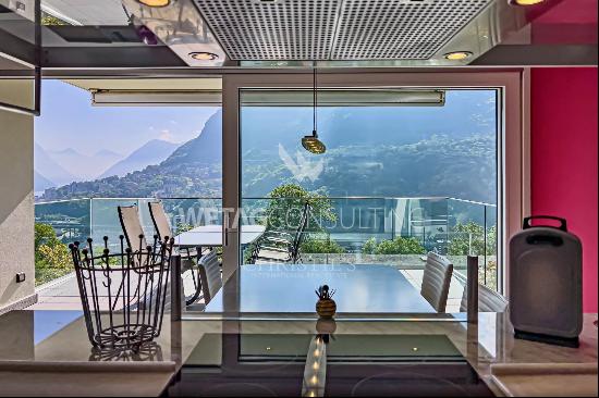 Montagnola: for sale modern apartment with a view on Lake Lugano