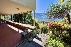 Bauhaus-style villa surrounded by greenery with stunning lake views for sale in Minusio