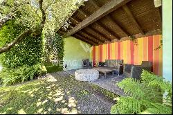 Modern style villa surrounded by greenery in Ascona for sale