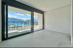 3.5 room apartment for sale in Carona with spacious terrace & views of Lake Lugano