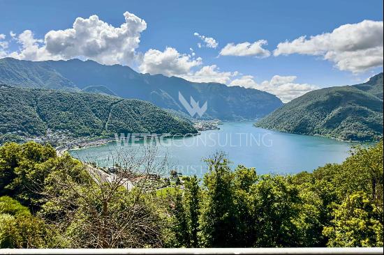 3.5 room apartment for sale in Carona with spacious terrace & views of Lake Lugano