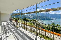 3.5 room apartment for sale in Carona with spacious terrace & views of Lake Lugano