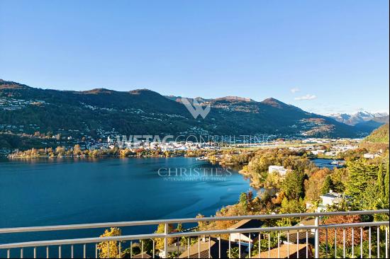 Large roof terrace & breathtaking lake view: modern penthouse apartment in Montagnola for