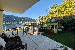 Large roof terrace & breathtaking lake view: modern penthouse apartment in Montagnola for