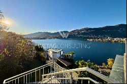 Large roof terrace & breathtaking lake view: modern penthouse apartment in Montagnola for