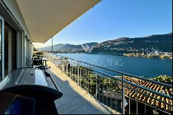 Large roof terrace & breathtaking lake view: modern penthouse apartment in Montagnola for