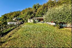 Lugano-Agno: villa for sale, prime for renovation, boasting a large plot, indoor pool & s