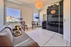 Modern penthouse apartment with lake view for sale in a central location in Locarno