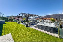 Lugano-Comano: elegant villa with large garden & panoramic view for sale