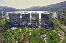 Muzzano: penthouse apartment for sale in front of Lake Lugano with rooftop terrace