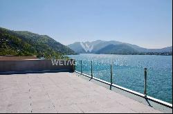 Muzzano: penthouse apartment for sale in front of Lake Lugano with rooftop terrace