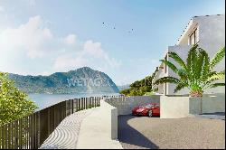 Lugano-Bissone: exclusive penthouse apartment for sale with stunning views over Lake Luga