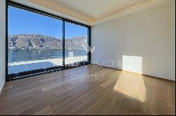 Lugano-Bissone: exclusive penthouse apartment for sale with stunning views over Lake Luga