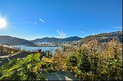 Stately villa in Montagnola with view of Lake Lugano for sale