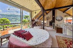 Lugano-Magliaso: charming villa for sale, nestled in lush greenery, featuring a swimming 