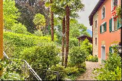 Lugano-Ruvigliana: elegant apartment with breathtaking lake views, pool & garden for sale