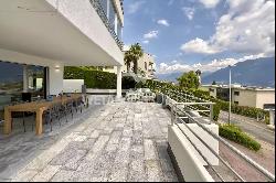 Exclusive apartment with large terrace, jacuzzi & partial lake view for sale in Locarno-M