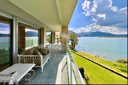 Lugano-Muzzano: charming penthouse apartment for sale, directly by the lake & with roof t