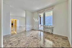 Lugano-Ruvigliana: stunning duplex penthouse with rooftop & breathtaking views of Lake Lu