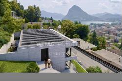 For sale in Lugano-Viganello: an elegant apartment with a private garden & stunning lake 