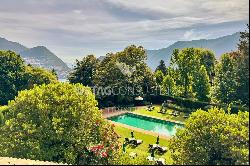 For sale in Lugano-Gentilino: elegant apartment with private garden & partial view of Lak