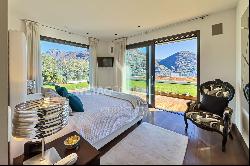 Prestigious duplex apartment in Porza with private garden & wide view of Lake Lugano for 