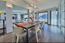 Prestigious duplex apartment in Porza with private garden & wide view of Lake Lugano for 