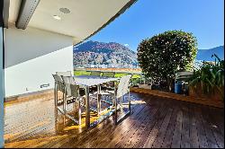 Prestigious duplex apartment in Porza with private garden & wide view of Lake Lugano for 