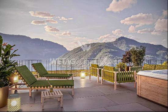 Modern penthouse apartment for sale in Lugano-Carona with breathtaking lake view & roof t