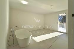 Lugano-Magliaso: Modern penthouse apartment for sale with lake view, available as a secon