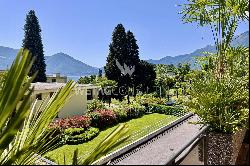 Modern apartment for sale in Ascona with partial view of Lake Maggiore