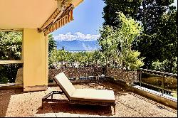 Modern apartment for sale in Ascona with partial view of Lake Maggiore